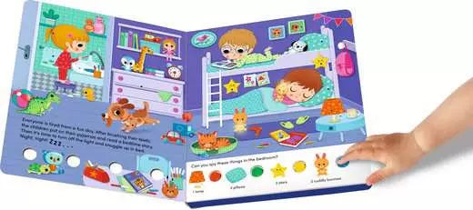 Vibrant open board book with bedroom illustrations and a child's hand pressing interactive buttons.