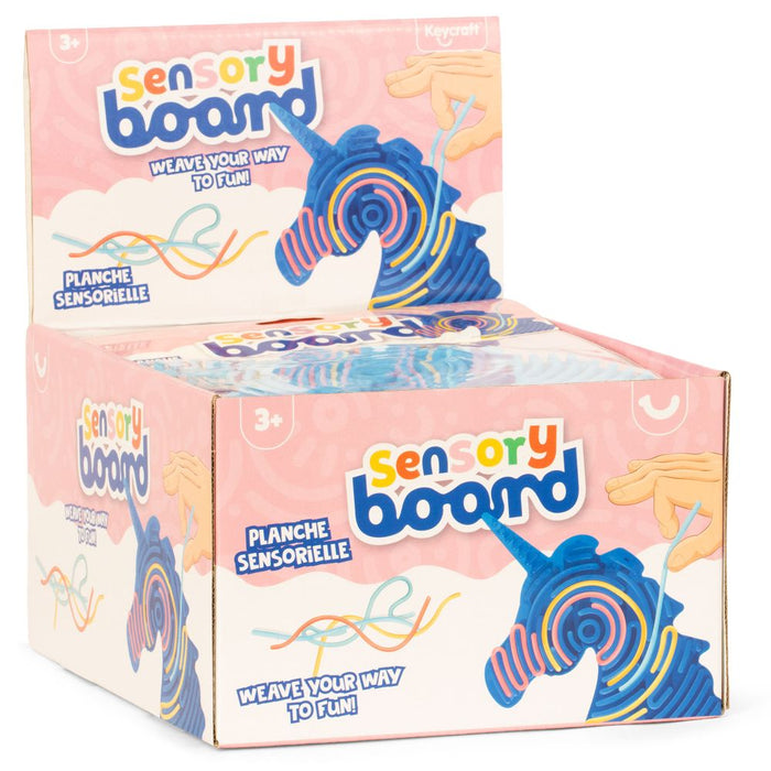 Pink display box of blue unicorn-shaped sensory boards with grooved paths for weaving colorful strings.