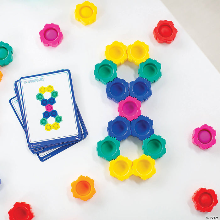 Colorful hexagonal interlocking poppers in a figure-eight shape next to challenge cards on a white background.