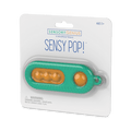 Teal textured oval fidget toy with four orange popping buttons in retail blister pack packaging.