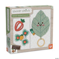 Boxed baby toy kit with an orange teether, green snail spinner, and plush smiling leaf toy with a wooden ring.