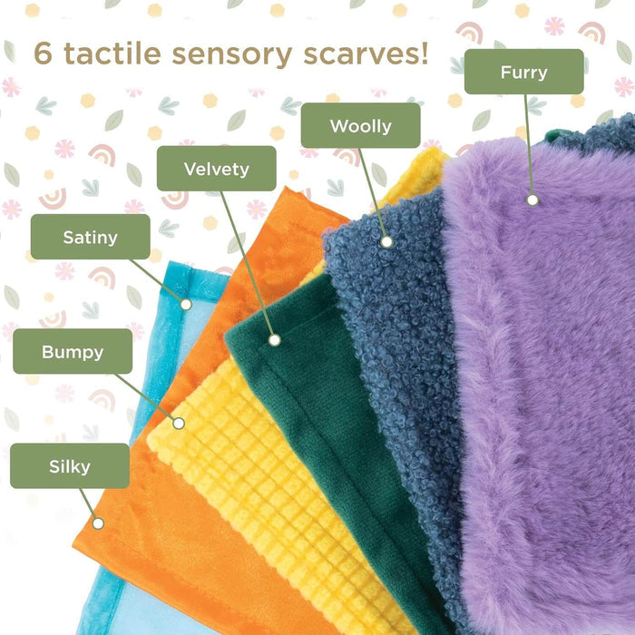 Six colorful textured scarves fanned out with labels for furry, woolly, velvety, satiny, bumpy, and silky fabrics.