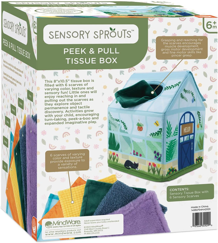 Greenhouse-shaped plush tissue box with colorful textured scarves on its product packaging, labeled for ages 6 months+.