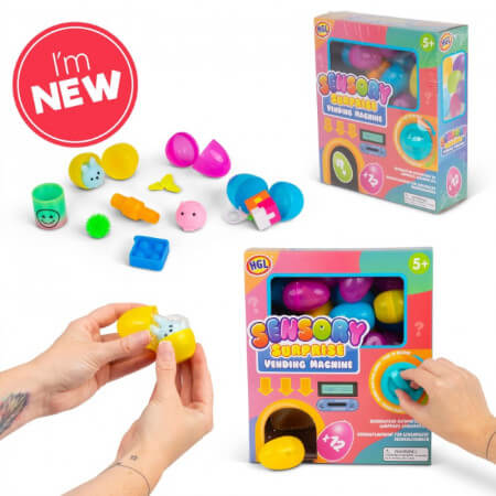 Toy vending machine box with colorful surprise eggs and small sensory fidget toys like squishies and a smiley spring.