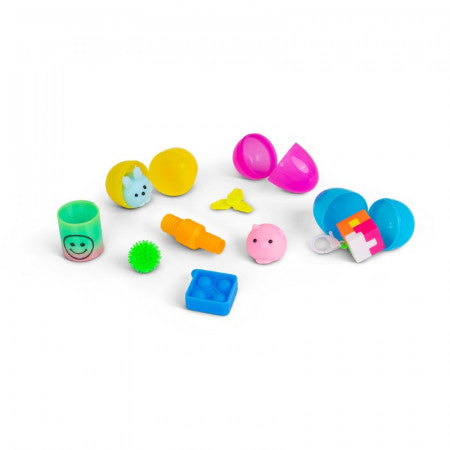 Assorted colorful sensory toys including squishies, a slinky, and fidgets next to open yellow, pink, and blue plastic eggs.