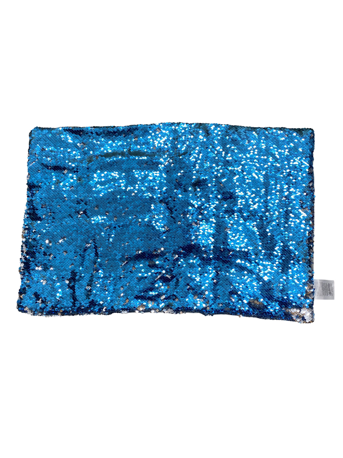 Sparkly blue rectangular weighted pad covered in reversible sequins, showing silver accents along the edges.