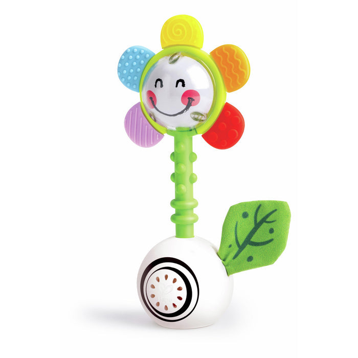 Flower rattle with a smiling face, colorful textured petals, bumpy green stem, and a white base with a fabric leaf.
