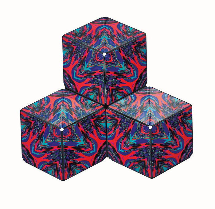 Three magnetic cubes stacked in a triangle, featuring a vibrant red, blue, and purple psychedelic pattern.
