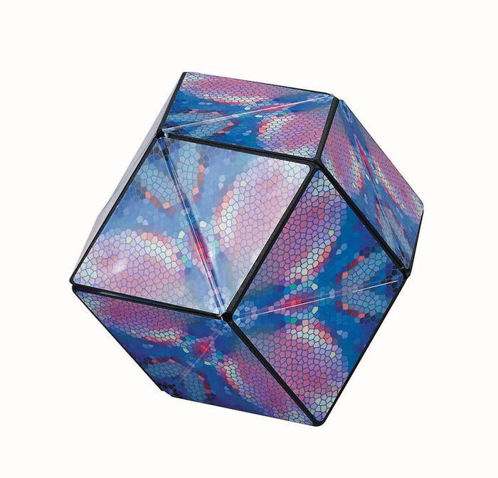 Faceted 3D geometric folding puzzle featuring a blue, purple, and pink mosaic pattern with black edges.