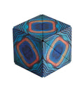 3D geometric folding puzzle featuring a vibrant blue, teal, and orange peacock feather pattern.