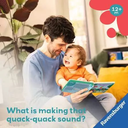 Man and toddler reading a colorful Ravensburger book with text: What is making that quack-quack sound?