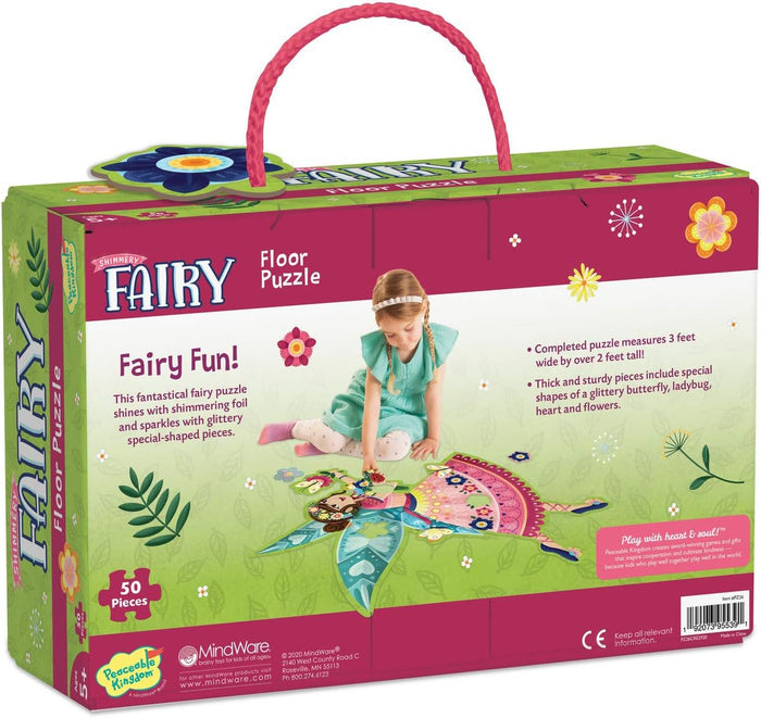 Pink box with a rope handle showing a child building a large, glittery fairy-shaped 50-piece floor puzzle.