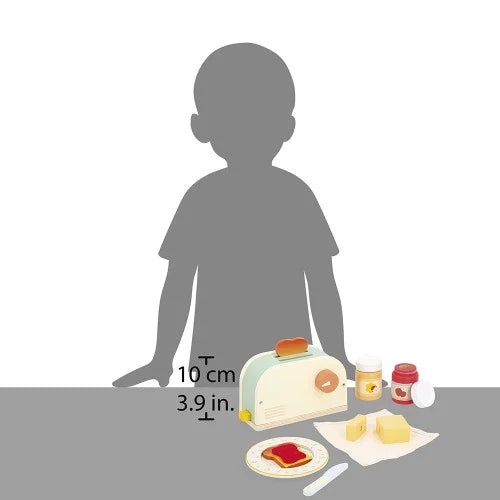 Pastel toy toaster with wooden toast, jam, and butter accessories shown for scale against a child silhouette.