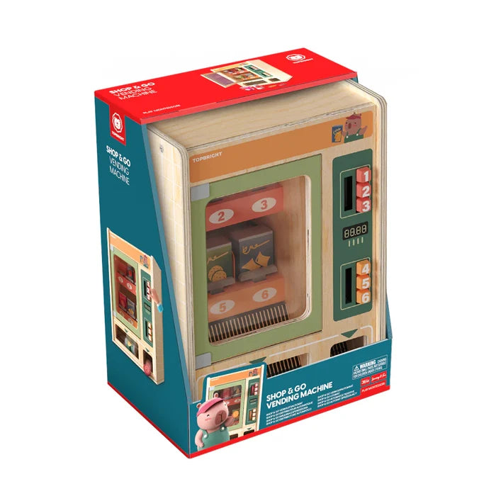 Wooden toy vending machine in red and teal packaging with numbered buttons, a digital display, and play snacks inside.