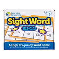 White game box with yellow and blue title text, bingo cards with sight words, and purple star markers.