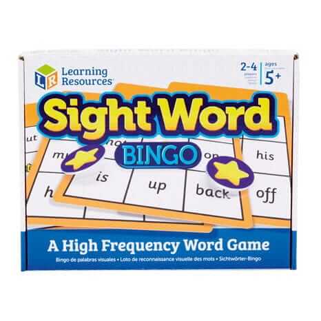 White game box with yellow and blue title text, bingo cards with sight words, and purple star markers.