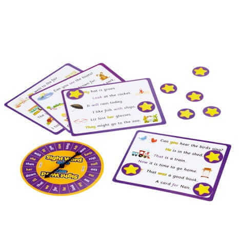 Educational word game with purple-bordered sentence cards, star tokens, and a yellow and purple spinning wheel.