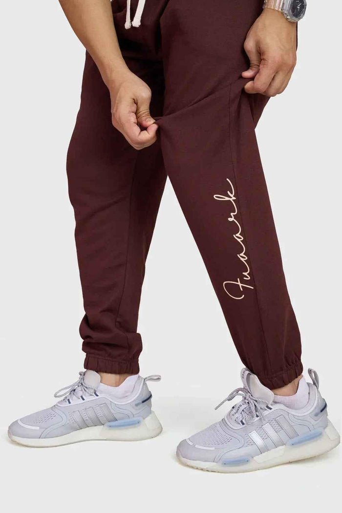 Fuaark Nz Signature oversized brown joggers with a relaxed fit and comfortable waistband, shown on a model.