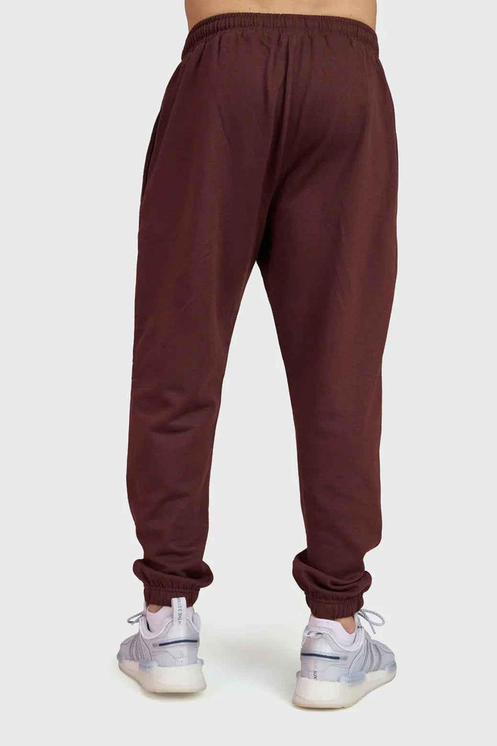 Fuaark Nz Signature Oversized Brown Joggers laid flat, showing soft fabric, relaxed fit, and casual style for comfort.