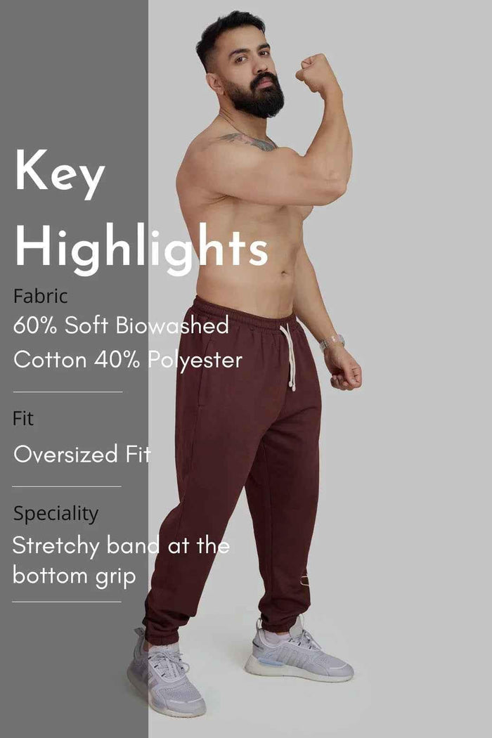 Fuaark Nz Signature oversized brown joggers, relaxed fit with drawstring waist, soft fabric, and stylish casual look.