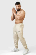 Fuaark Nz Signature Oversized Beige Joggers with relaxed fit and elastic waistband, casual loungewear for men.