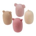 Four egg-shaped silicone bath toys in muted pink, tan, and cream shaped like a pig, koala, tiger, and chick.