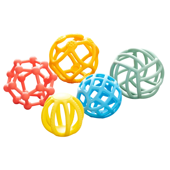 Five colorful, flexible open-frame balls in red, yellow, blue, and green, each with a unique geometric design.