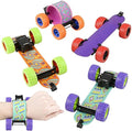 Four colorful, patterned toy skateboards with chunky wheels; one shown snapped around a wrist like a bracelet.