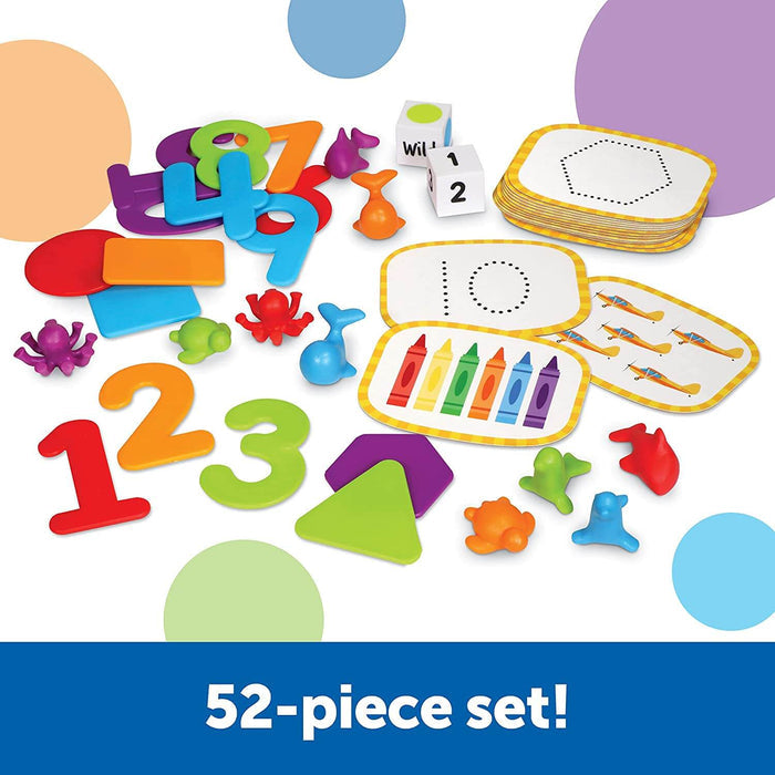 Colorful plastic numbers, animal counters, dice, and activity cards from a 52-piece educational math and counting set.