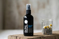 Spray bottle of Do Not Disturb Sleep Company Sleep Mist with floral and calming label, designed to promote restful sleep.