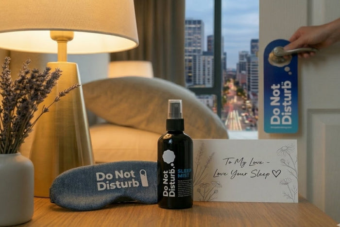 Spray bottle of Do Not Disturb Sleep Company Sleep Mist with botanical ingredients for relaxing nighttime aroma.