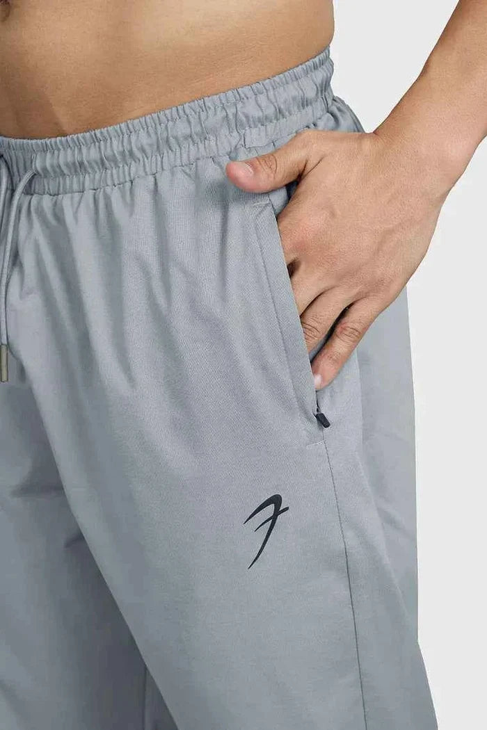 Fuaark Nz smart casual light grey track pants with a relaxed fit and elastic waistband, suitable for everyday wear.
