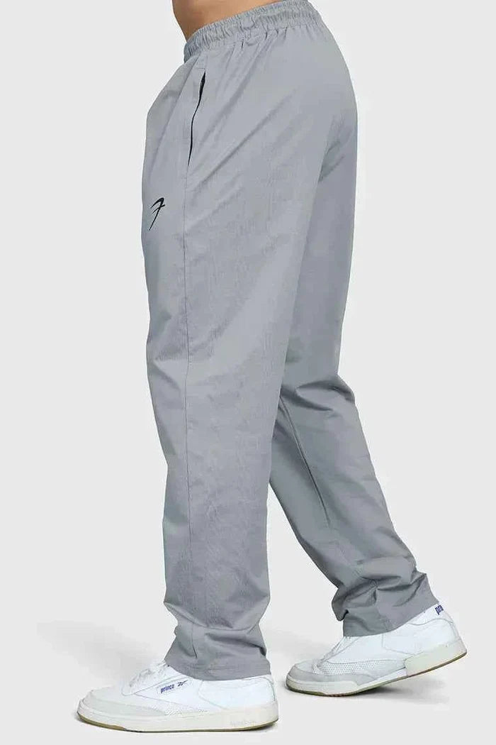 Fuaark Nz smart casual light grey track pants, comfortable fit, featured on a model, ideal for casual or athletic wear
