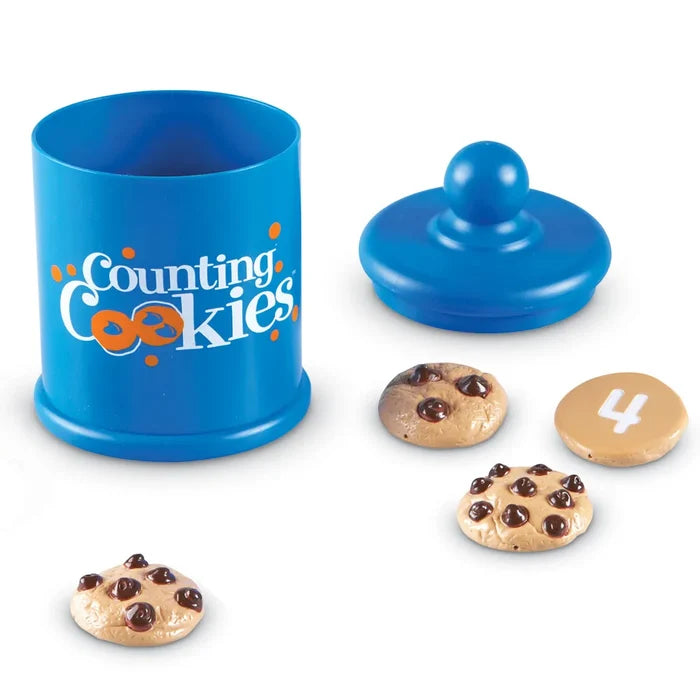 Blue toy cookie jar with lid and four plastic chocolate chip cookies, one showing the number 4.