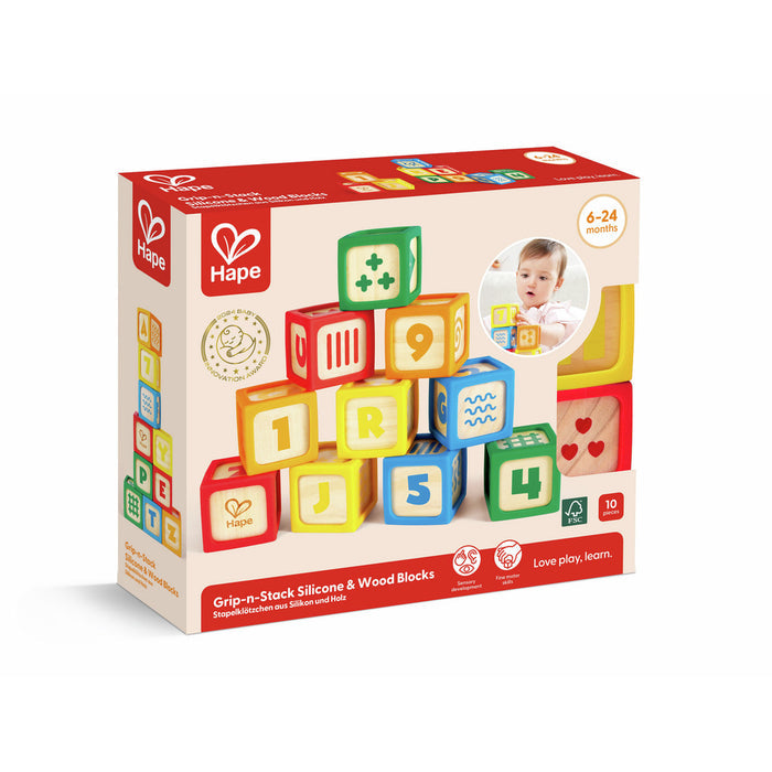 Hape box of 10 colorful silicone and wood blocks with embossed numbers and letters for babies aged 6 to 24 months.