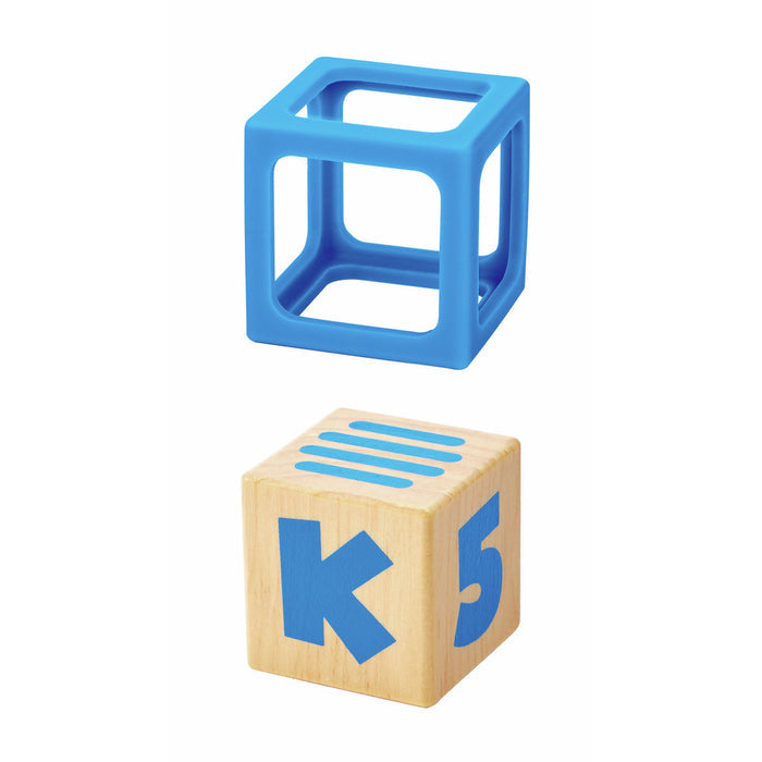 Hollow blue silicone cube frame above a wooden block with a blue letter K, number 5, and stripes.