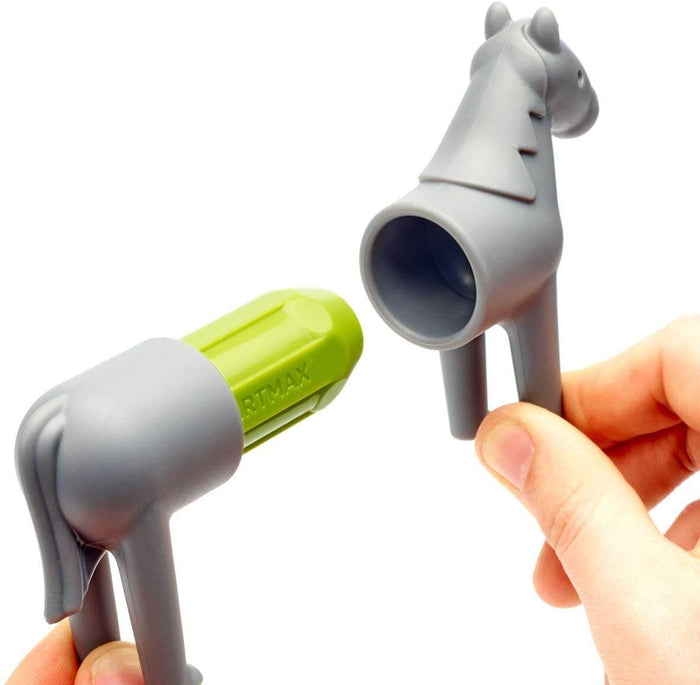 Hands separating grey horse toy pieces joined by a green magnetic rod.