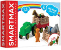 SmartMax box with a green magnetic tractor, red trailer, brown and gray horses, fences, and an orange figure.