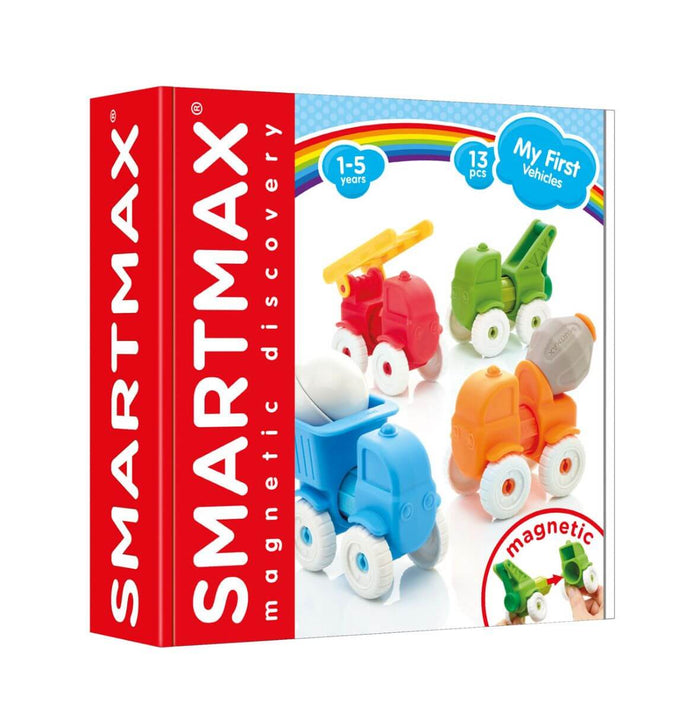 Red SmartMax box showing four colorful magnetic toy trucks: fire truck, crane, cement mixer, and dump truck.