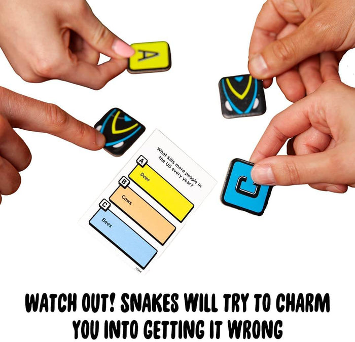 Hands holding lettered and snake game tiles over a trivia card with options for deer, cows, and bees.