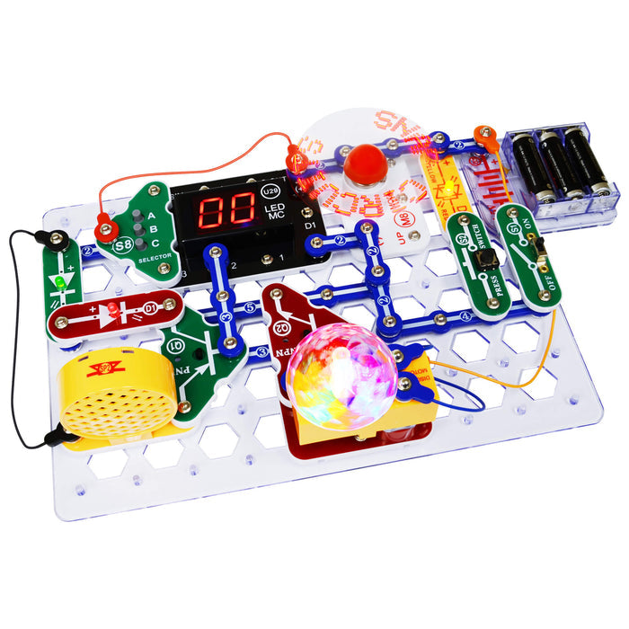 Electronics toy with colorful snap-on parts, 2-digit LED display, and glowing disco ball on a clear grid base.