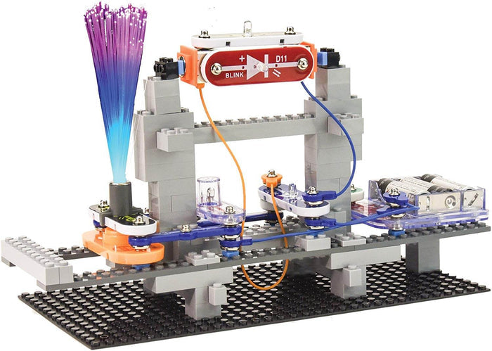 Toy structure made of gray building blocks and snap-on electronic components with glowing fiber optics.
