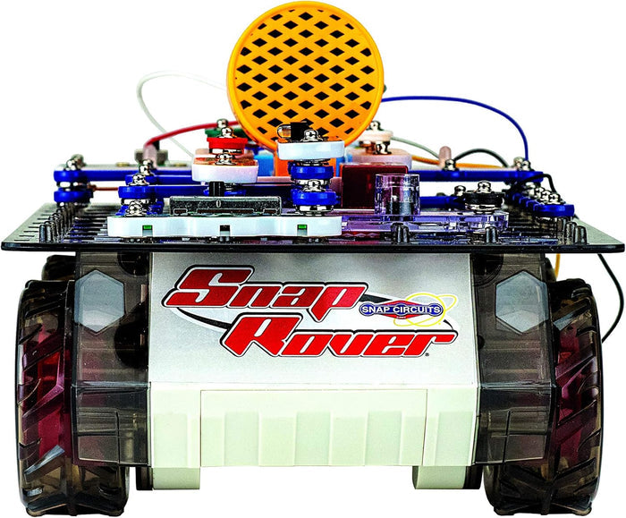 Front view of a toy rover with red logo, large wheels, and colorful circuit parts including a yellow circular disk.