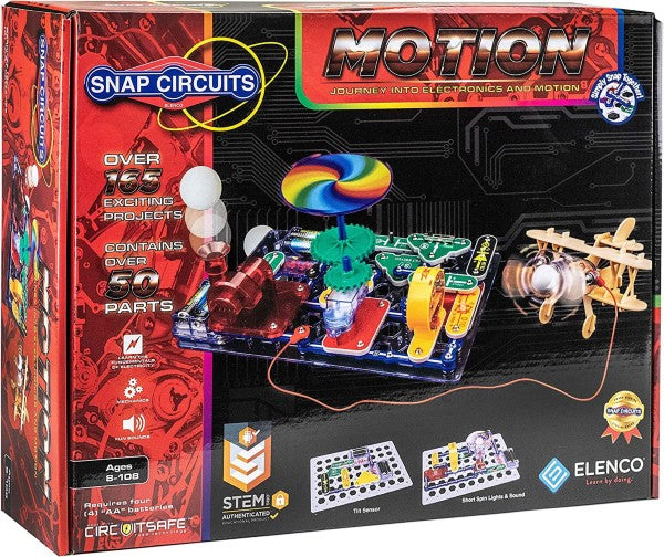 Red and black box for an electronics kit with a circuit board featuring a rainbow fan, gears, and a wooden toy plane.