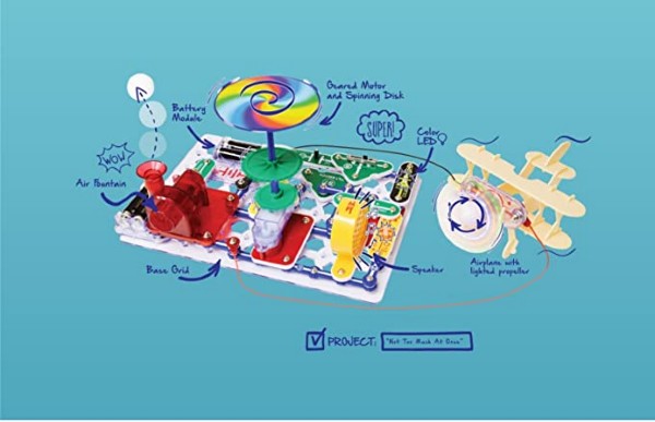 Labeled circuit board with spinning spiral disk, red air fountain, yellow speaker, and airplane toy on blue background.