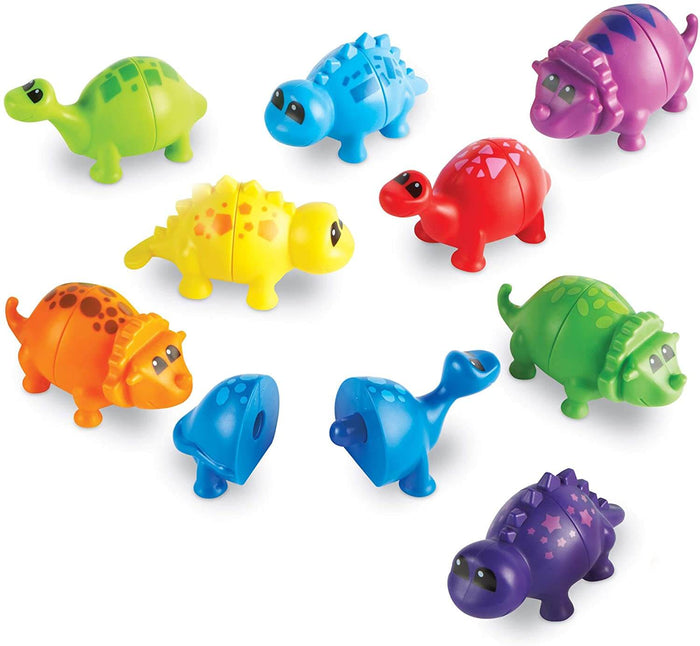 Nine colorful toy dinosaurs of different species. A blue dinosaur is split into two snap-together pieces.