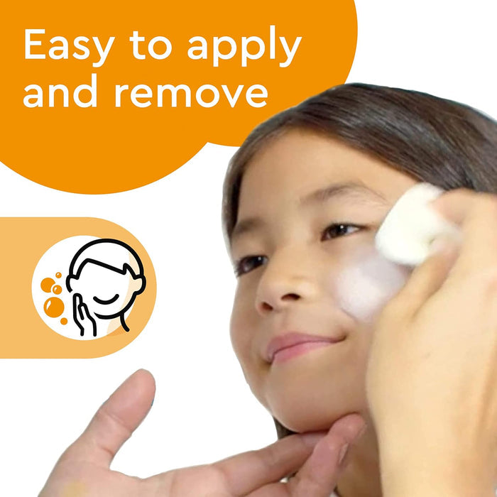 Child's face being wiped with a white sponge. Text: Easy to apply and remove on orange background with face icon.