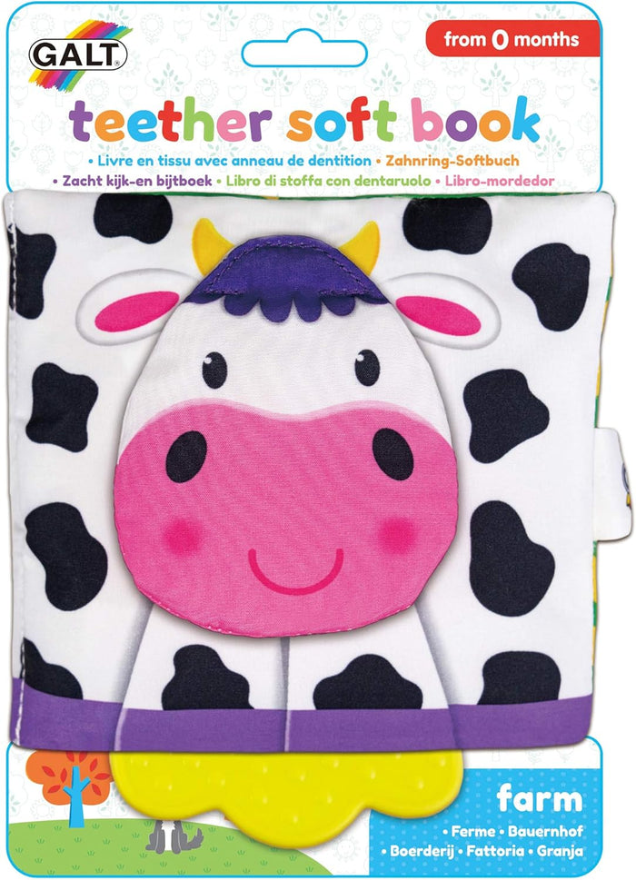 Farm-themed soft baby book with a cow on the cover and a yellow textured teether attached to the bottom.