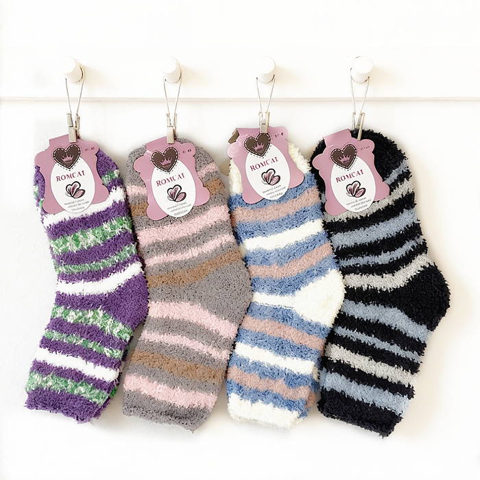 Pair of soft, warm fleece socks from dealonline.co.nz, plush slipper socks with fluffy microfiber for winter comfort.