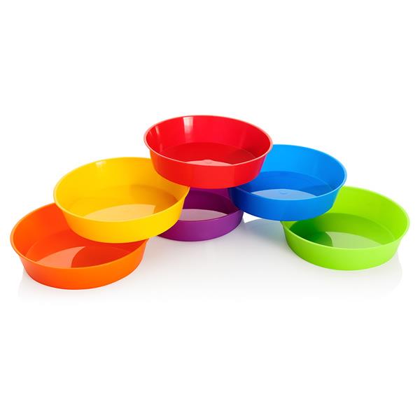 Six shallow, round plastic bowls in rainbow colors arranged in a layered cluster on a white background.